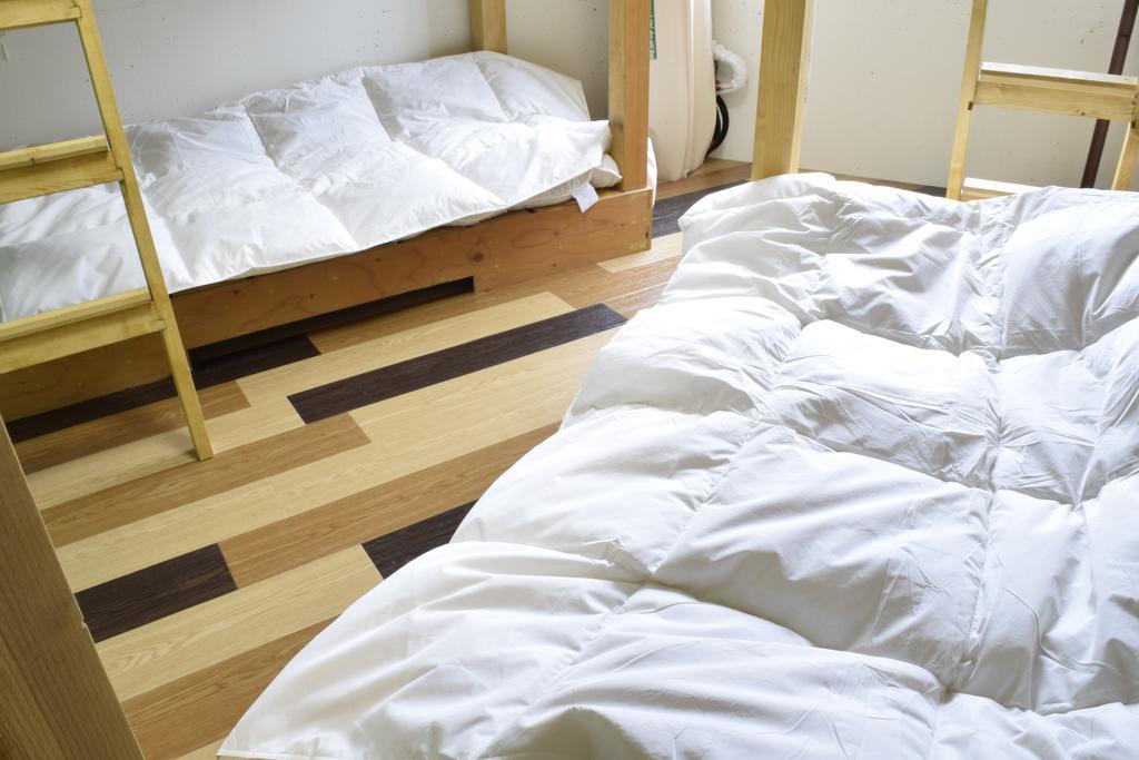 Iza Asakusa Guest House Tokió Szoba fotó